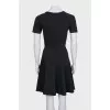 Fitted black dress with short sleeves