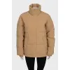 Beige jacket with a high collar