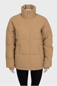 Beige jacket with a high collar