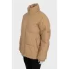 Beige jacket with a high collar