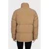 Beige jacket with a high collar