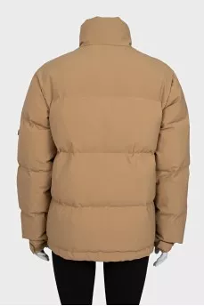 Beige jacket with a high collar