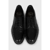 Black leather lace-up brogues