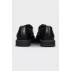 Black leather lace-up brogues