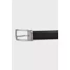 Men's leather belt with a rectangular buckle