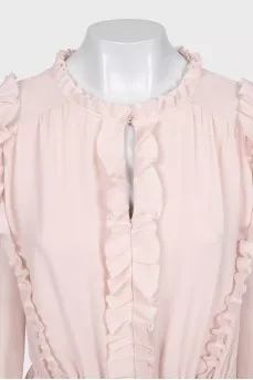 Fitted dress decorated with frills