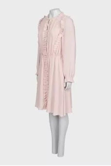 Fitted dress decorated with frills