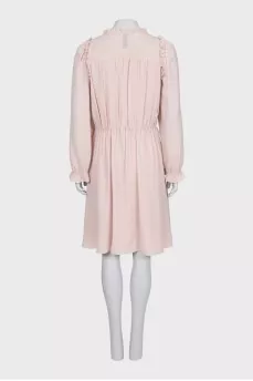 Fitted dress decorated with frills