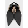 Leather ankle boots with pointed toe and zip closure