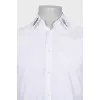 Men's shirt decorated with embroidery