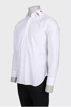 Men's shirt decorated with embroidery