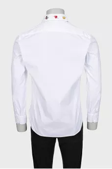Men's shirt decorated with embroidery