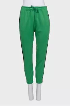Green suit with embroidery on the back