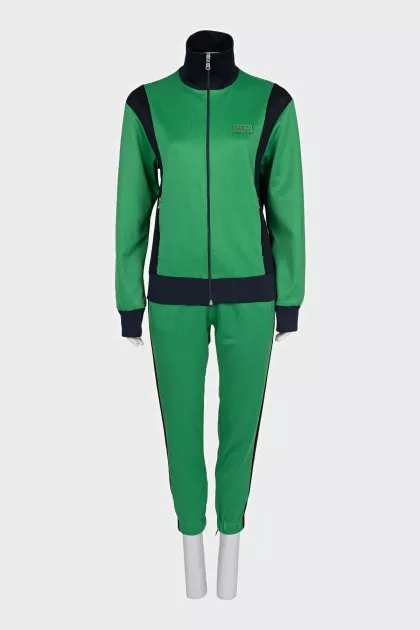 Green suit with embroidery on the back
