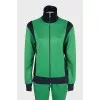 Green suit with embroidery on the back