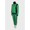 Green suit with embroidery on the back