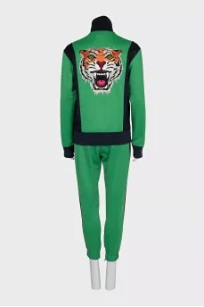 Green suit with embroidery on the back