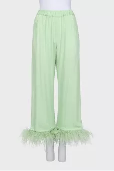 Green suit with removable feathers on the legs