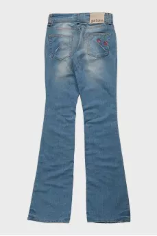 Light blue flared jeans with tag