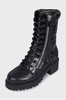 Black leather boots with tag