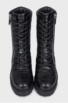 Black leather boots with tag