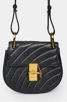 Bag with golden twist closure