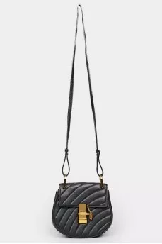 Bag with golden twist closure