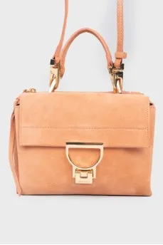 Suede bag with curly fastener
