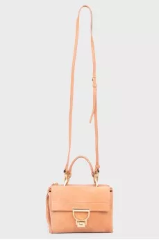 Suede bag with curly fastener