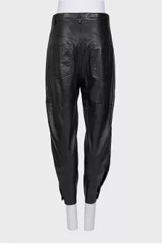 Leather trousers with buttons at the bottom of the legs