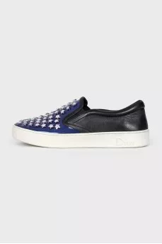 Blue leather slip-ons with decor