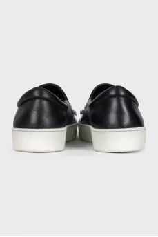 Blue leather slip-ons with decor