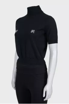 Black wool top with brand logo