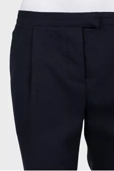 Black trousers with roll-ups