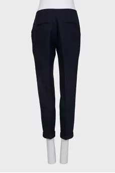 Black trousers with roll-ups