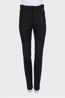 Straight black trousers with slits at the bottom