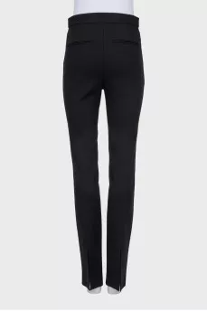 Straight black trousers with slits at the bottom