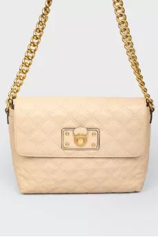 Starned bag made of beige leather