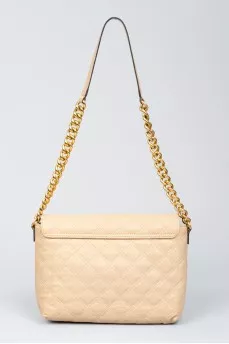 Starned bag made of beige leather