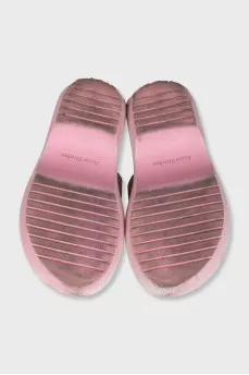 Pink suede flip-flops