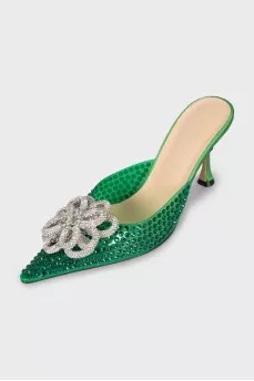 Green mules decorated with rhinestones