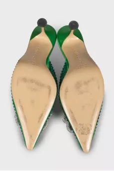 Green mules decorated with rhinestones