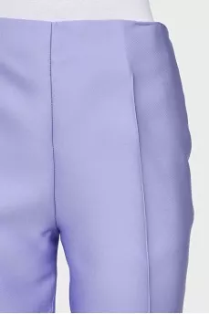 Purple trousers with creases