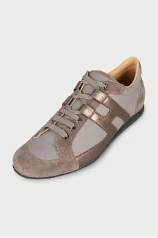 Sneakers with a leather logo insert