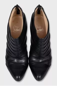 Black ankle boots with pleated leather
