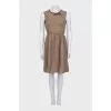 Fitted dress with a buttoned jacket