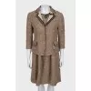 Fitted dress with a buttoned jacket