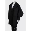 Wool coat with accent sleeves