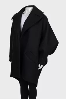 Wool coat with accent sleeves