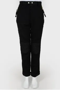 High-rise trousers with zipper and buttons